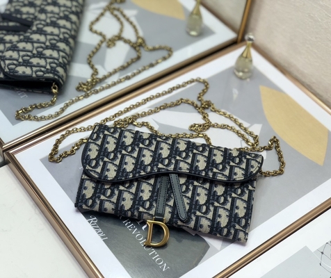 El OEM calificó la silla de montar Dior Oblique Jacquard Pouch Wallet largo