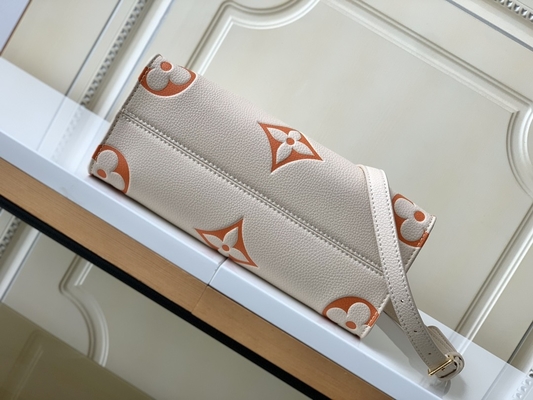 Monograma gigante en camino milímetro Louis Vuitton Messenger Bag For Ipad Mini del azafrán poner crema