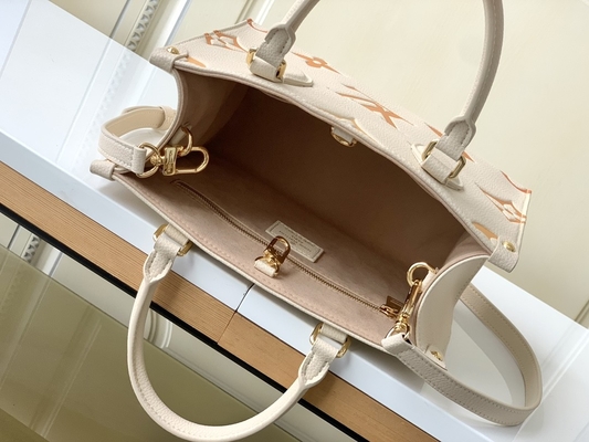 Monograma gigante en camino milímetro Louis Vuitton Messenger Bag For Ipad Mini del azafrán poner crema