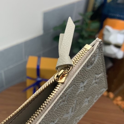 Primavera blanca del bolso de Pochette Felicie LV en el monograma Empreinte de la ciudad