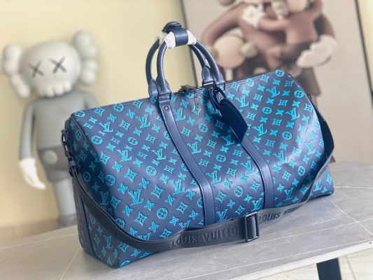 Bolsos azules calificados grandes de Keepall BANDOULIÈRE 50 para hombre Boston del bolso