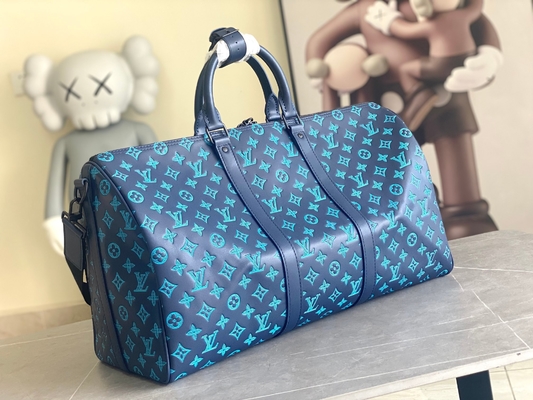 Bolsos azules calificados grandes de Keepall BANDOULIÈRE 50 para hombre Boston del bolso