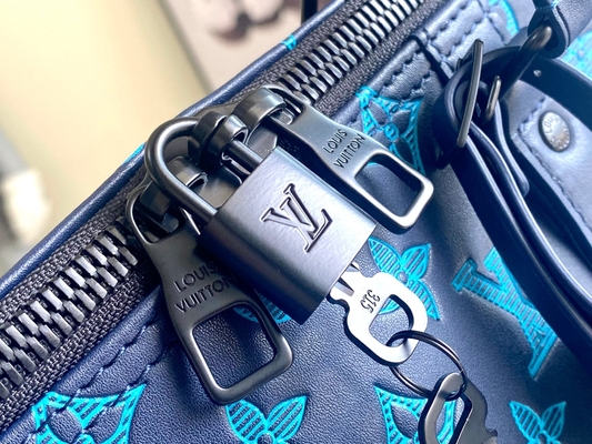 Bolsos azules calificados grandes de Keepall BANDOULIÈRE 50 para hombre Boston del bolso