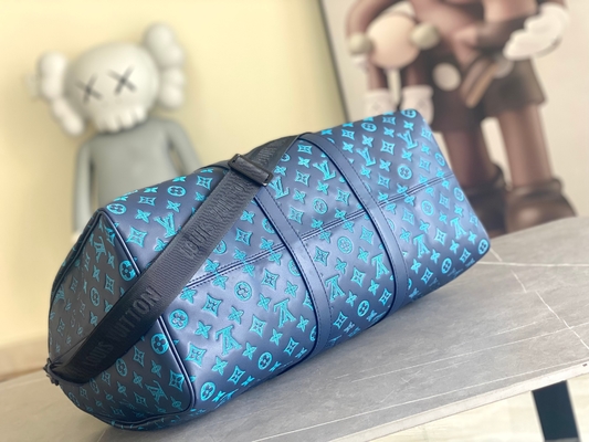 Bolsos azules calificados grandes de Keepall BANDOULIÈRE 50 para hombre Boston del bolso