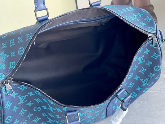 Bolsos azules calificados grandes de Keepall BANDOULIÈRE 50 para hombre Boston del bolso